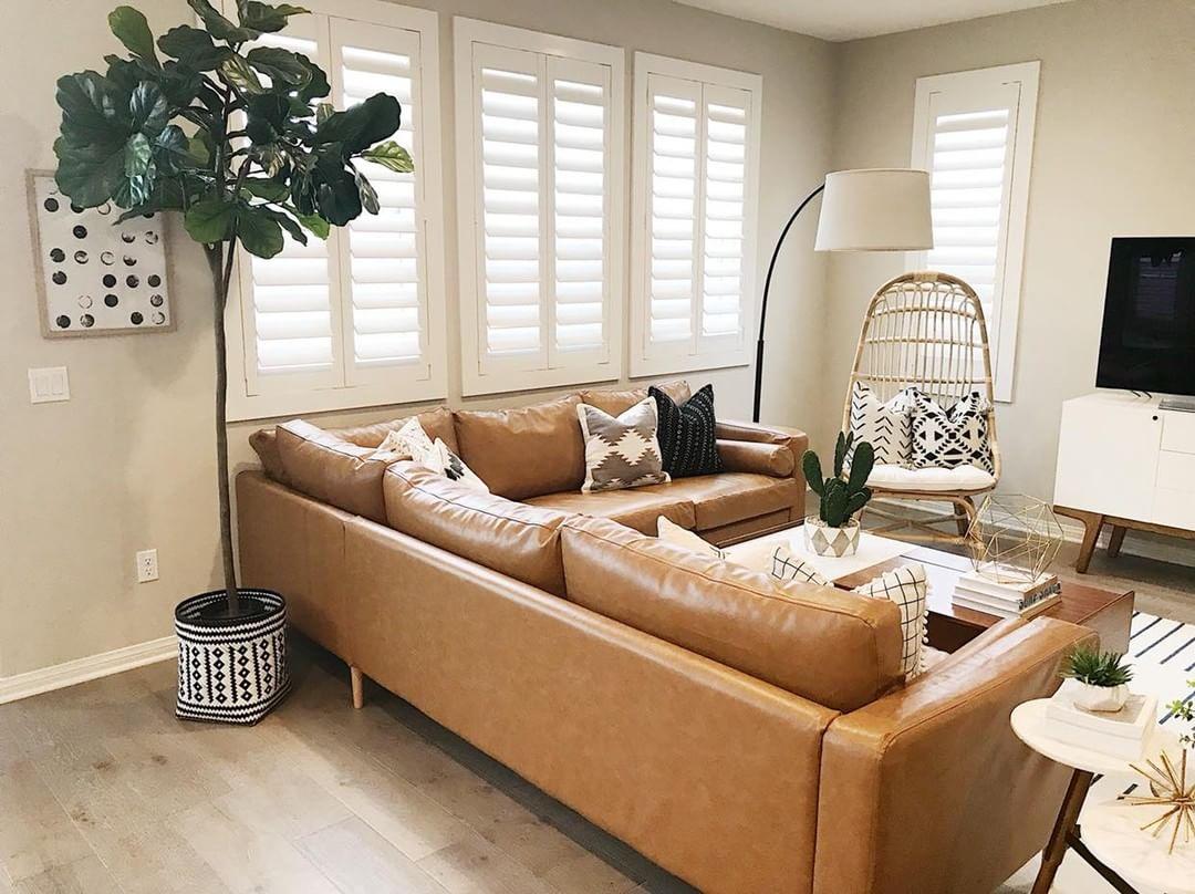 Warm living room with our Polywood shutters in San Antonio.
